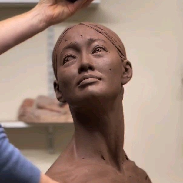 clay face sculpture