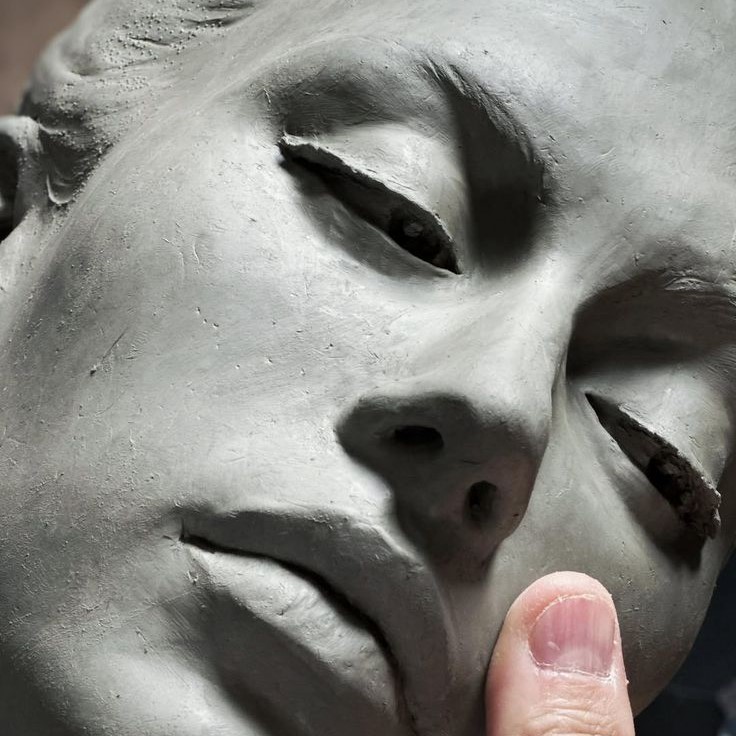 clay face sculpture