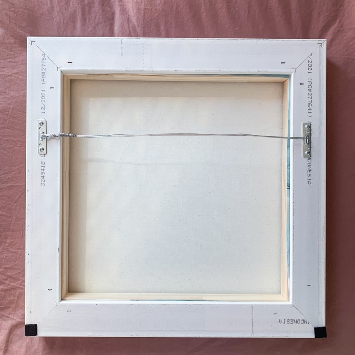 how to hang a canvas painting