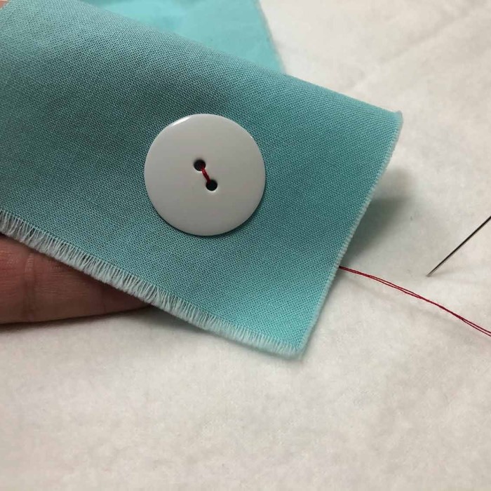how to sew a button