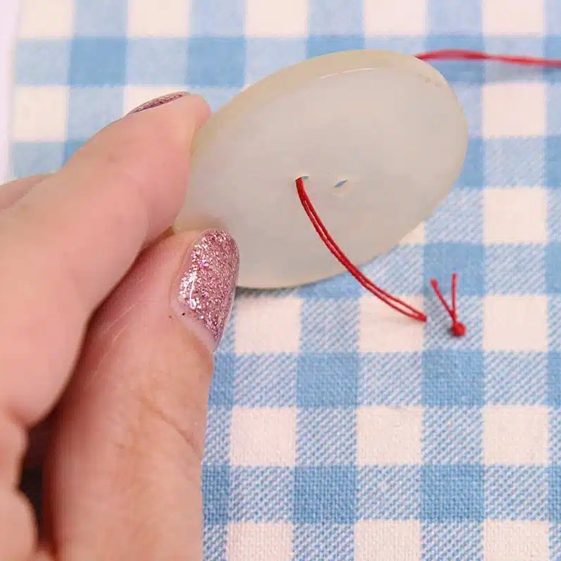 how to sew a button